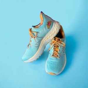 New Balance Light Blue and Orange Sneakers